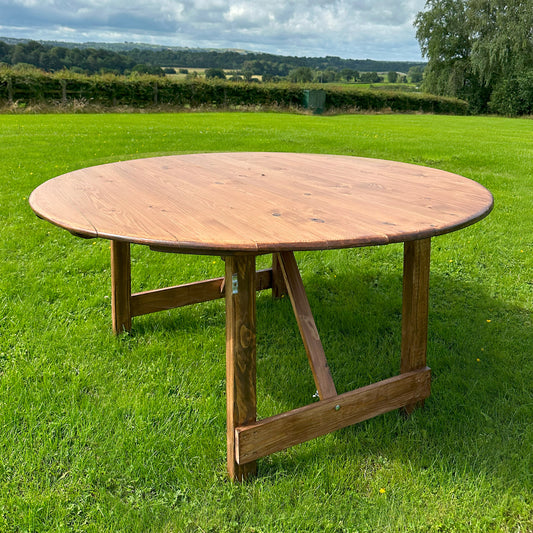 2. Outdoor Round Folding Rustic-style Trestle Table