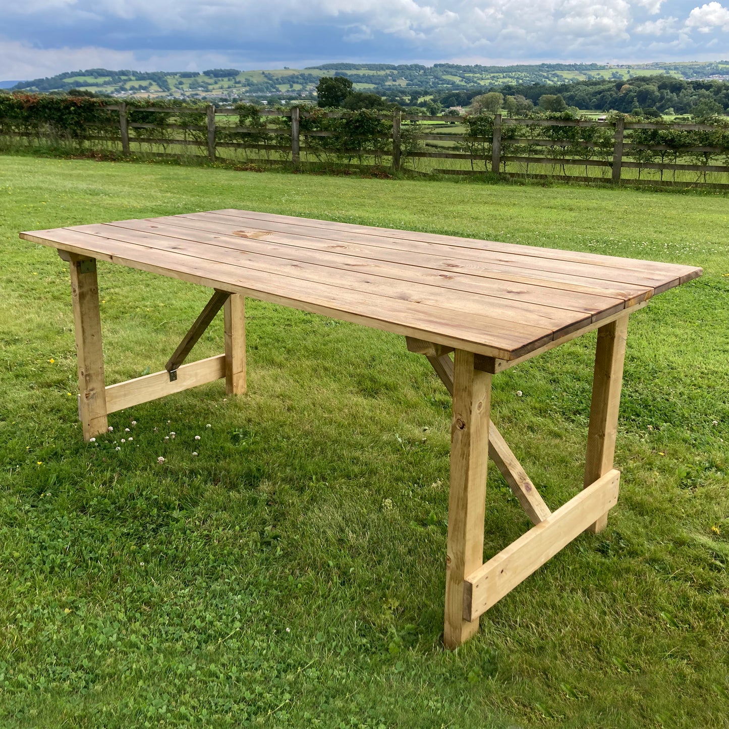 2. Outdoor Folding Rustic-style Trestle Table