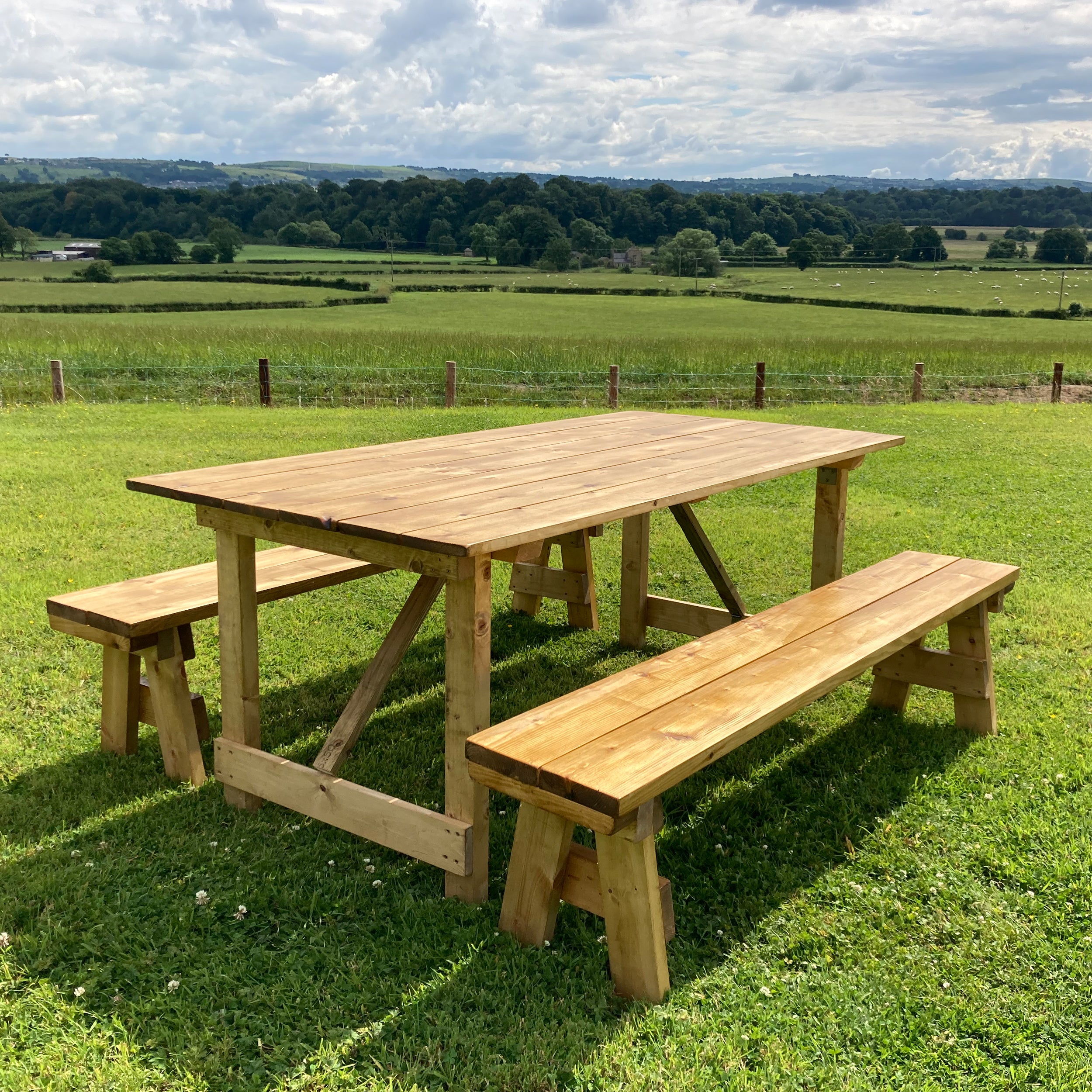 3. Indoor Folding Rustic-style Bench – The Trestle Table Company